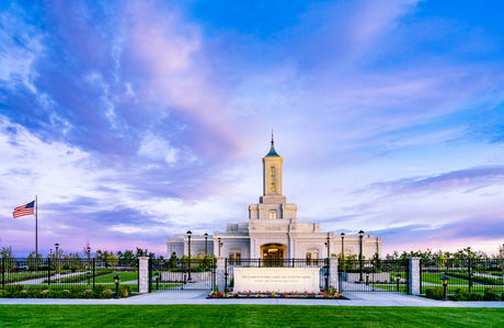 The Moses Lake Washington Temple a blue and purple sky.