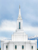 The Orem Utah Temple with a blue sky background.