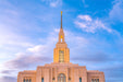 The Red Cliffs Utah temple with a blue and pink sky.