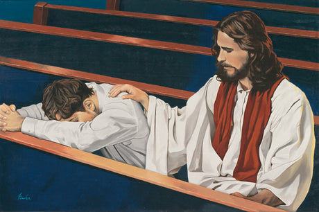 Jesus Christ comforting a man sitting in a pew and praying.