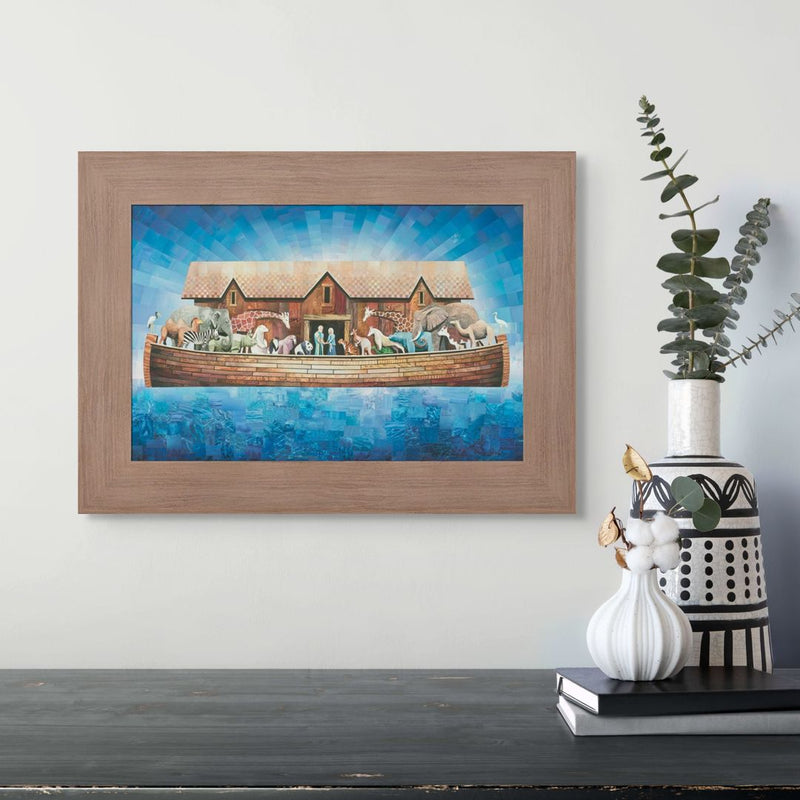Framed artwork of a Noah's Ark scene on a wall above a table with decorative items.