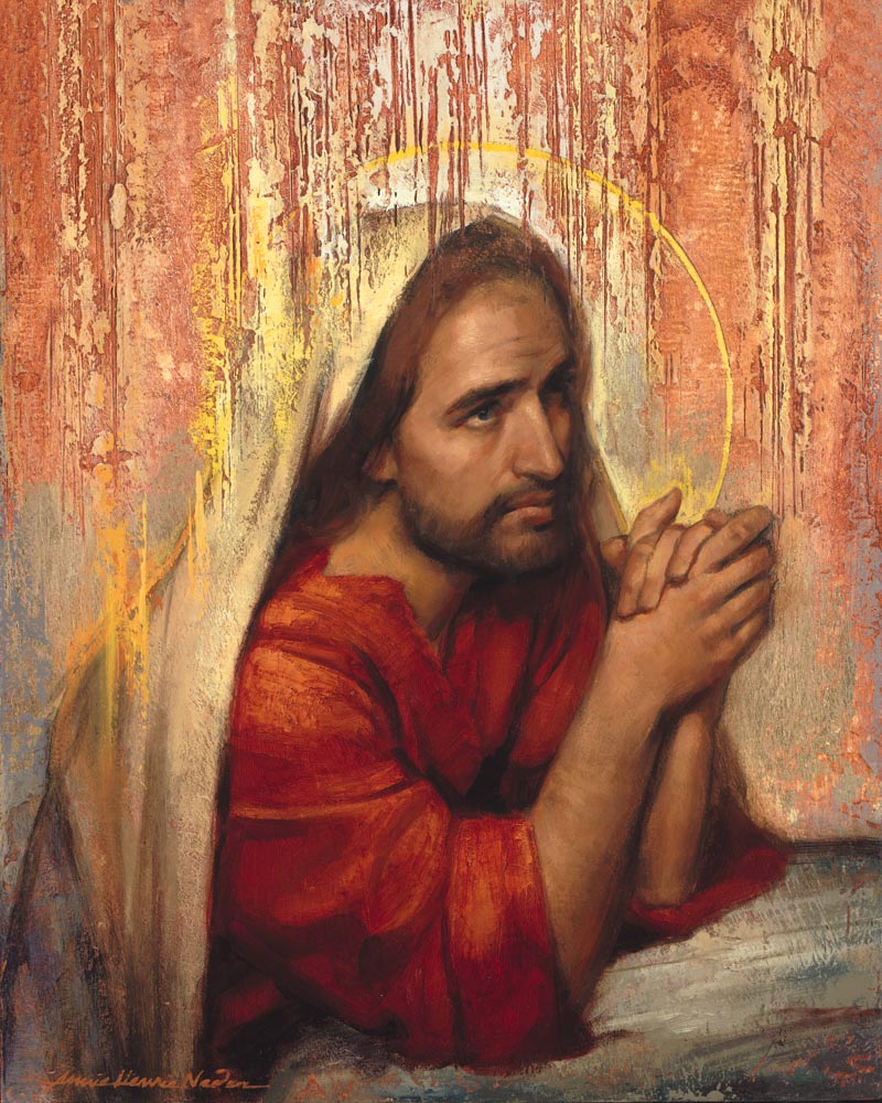 Jesus clothed in red praying against rock in Gethsemane.