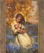 A mother holding and praying for her child surrounded by autumn leaves. 