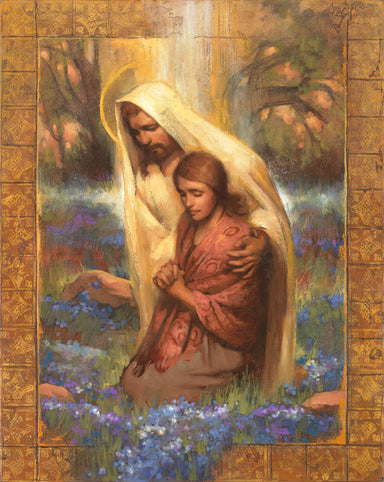 Jesus comforts women while she kneels in prayer. 