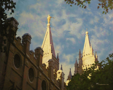 Looking up at Salt Lake temple spires, image of Jesus in the clouds. 