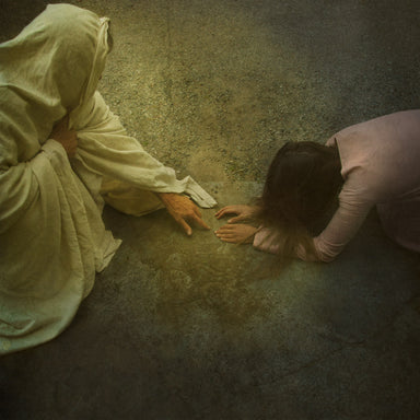 Jesus writing on the ground with a woman who has sinned. 