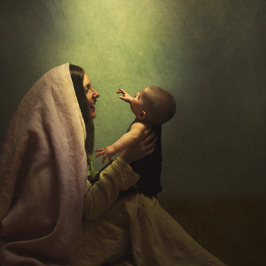 Mary happily looking at her baby, the Son of God. 