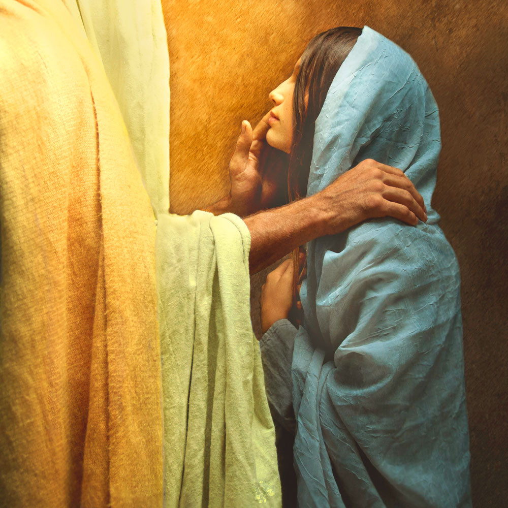 Picture of Jesus Christ comforting a woman.