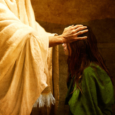 Jesus placing His hands on the head of a young woman to heal her.
