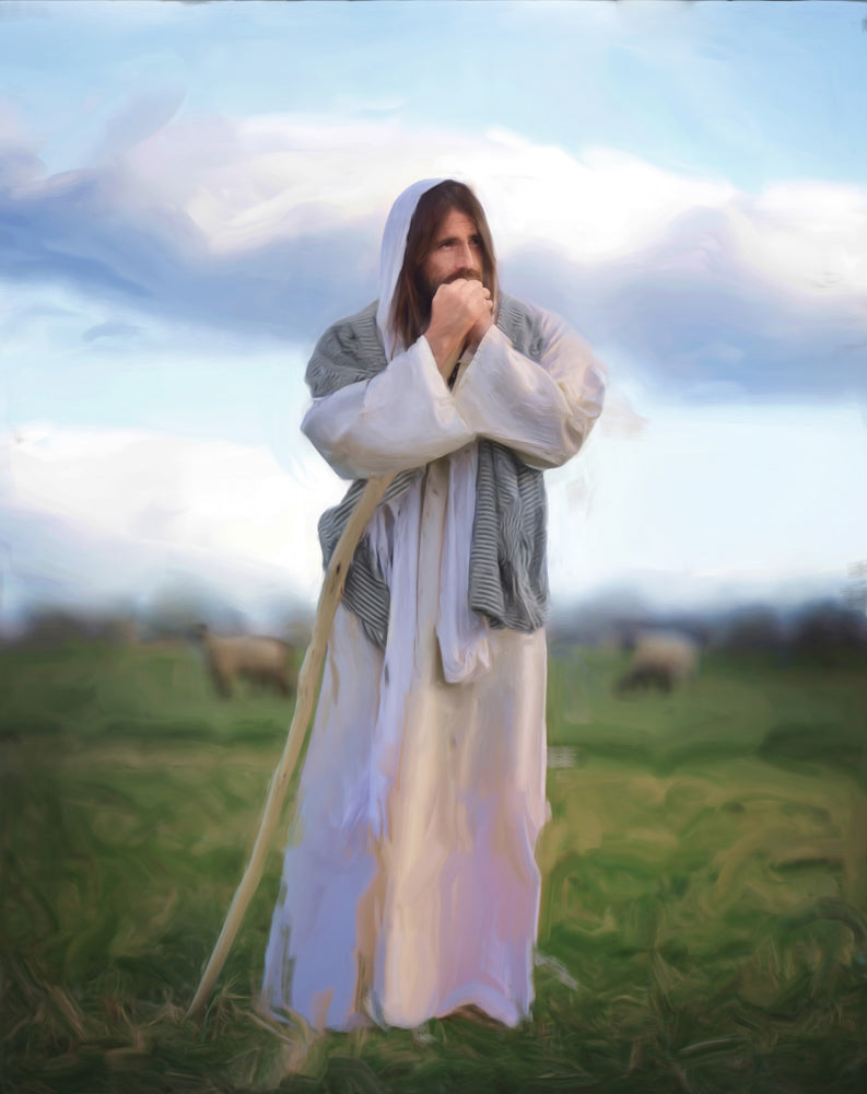 Jesus standing in a field with His hands clasped as He holds them up in front of His face.
