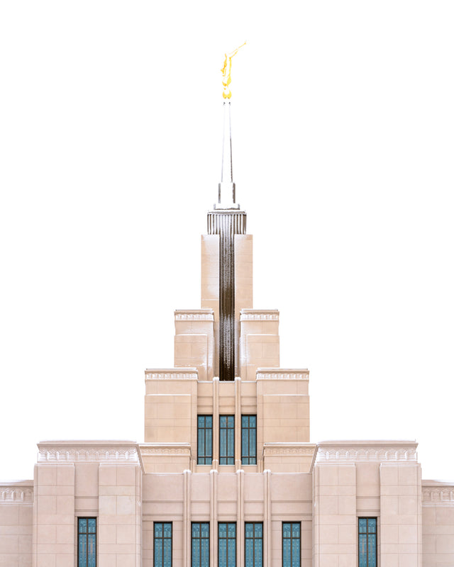 A close up of the Saratoga Springs Utah temple's spire, lightly dusted with snow.