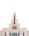 A close up of the Saratoga Springs Utah temple's spire, lightly dusted with snow.