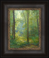 Joseph Smith kneeling in a grove of trees with a beam of light shining on him. Art 10