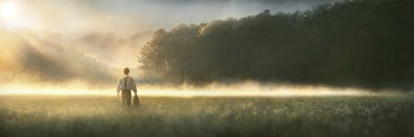 Young Joseph Smith walking towards a grove of trees. art 10