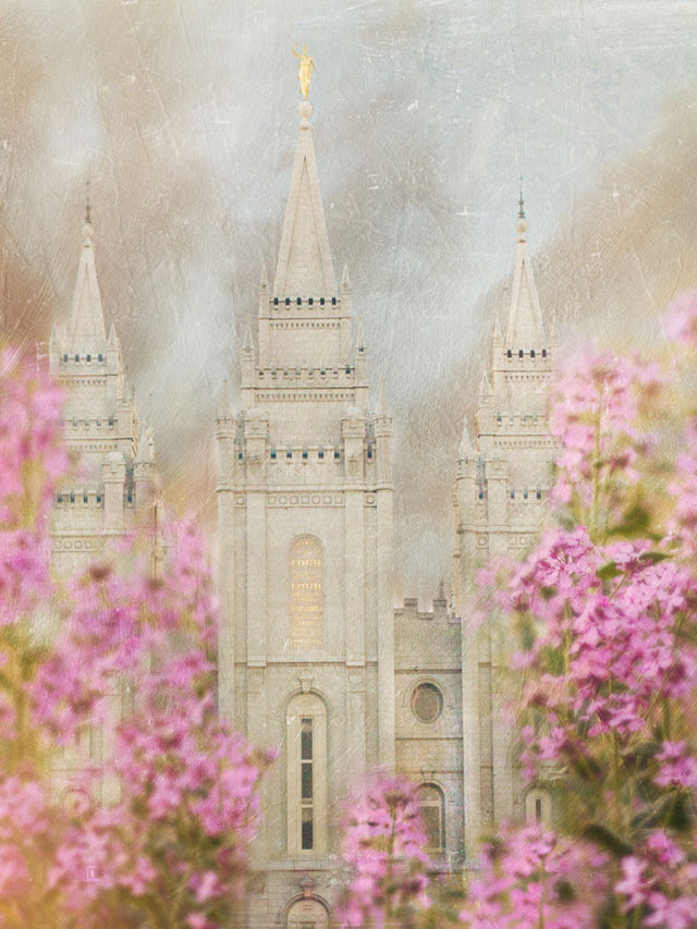 Salt Lake Utah Temple with pink blossoms. 