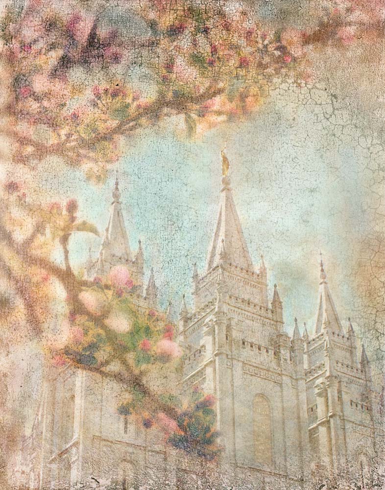 Salt Lake Utah Temple spires with pink blossoms. 