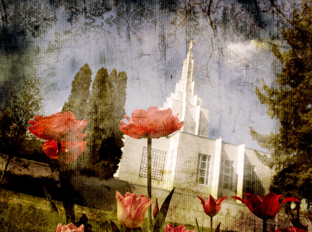 Idaho Falls Idaho Temple with red flowers and trees. 