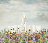 Jordan River Utah Temple with purple and orange flowers. 