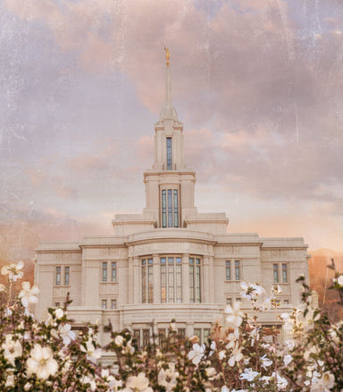 Payson Utah Temple with white flowers. 