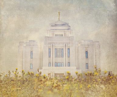 Meridian Idaho Temple with yellow flowers. 