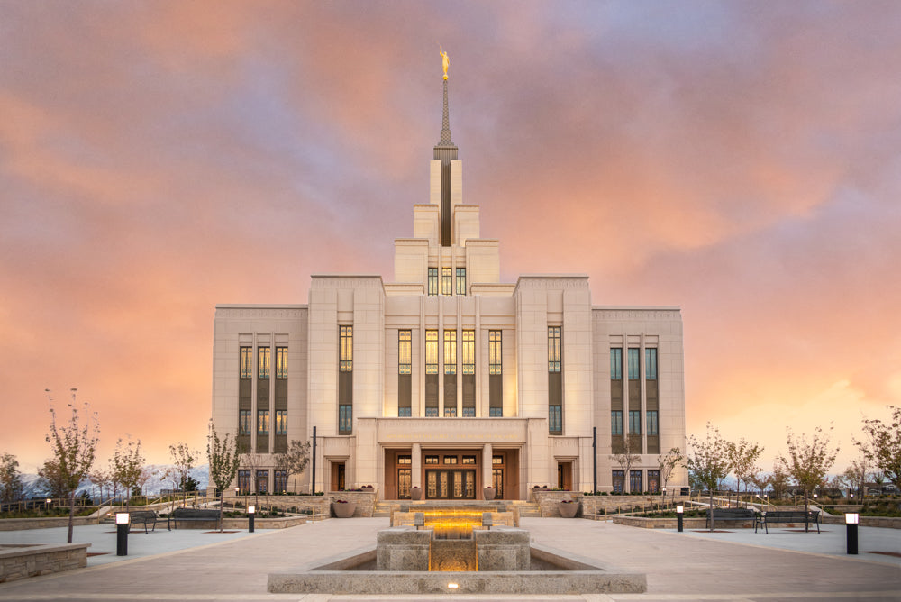 The Saratoga Springs Utah temple with a sunset sky.