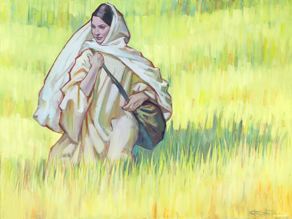A women walking in field with long green grass. 