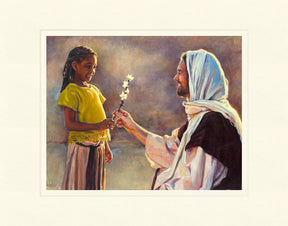 A little girl handing a flower to Jesus.