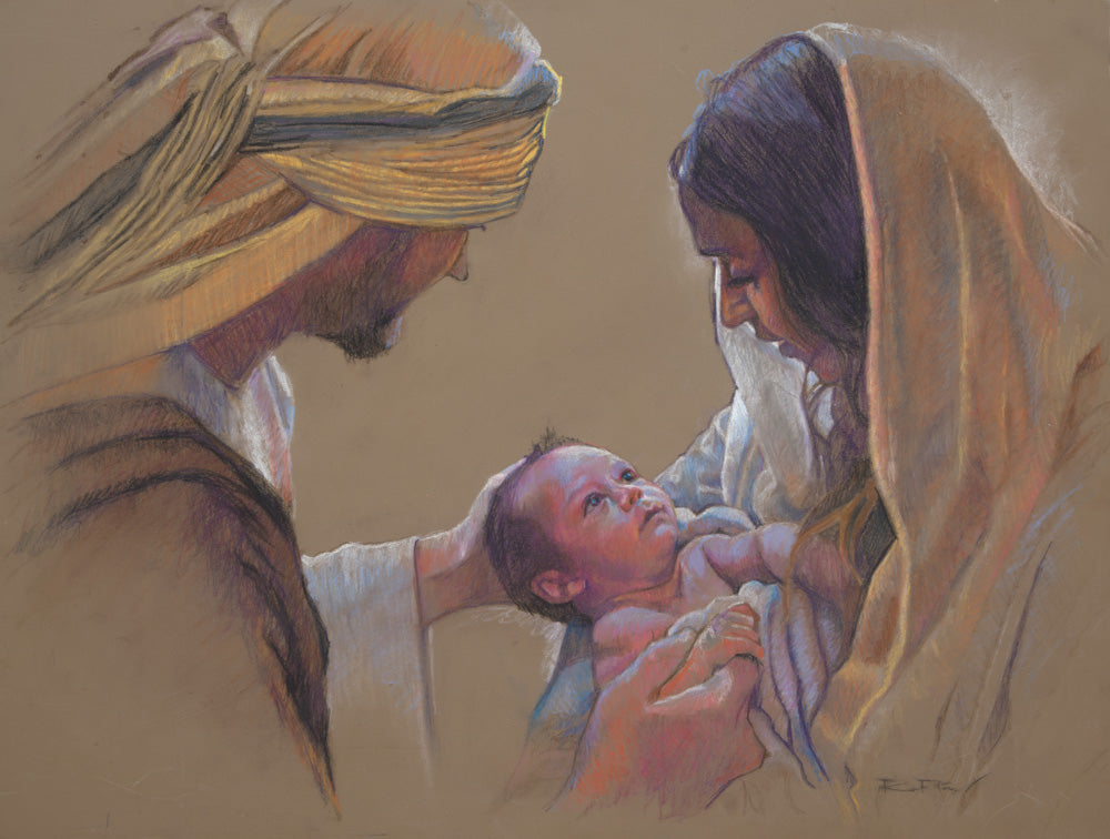 Mary and Joseph holding the new born baby Jesus. 