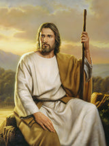 Christ seated on a rock holding a staff represents strength and compassion.