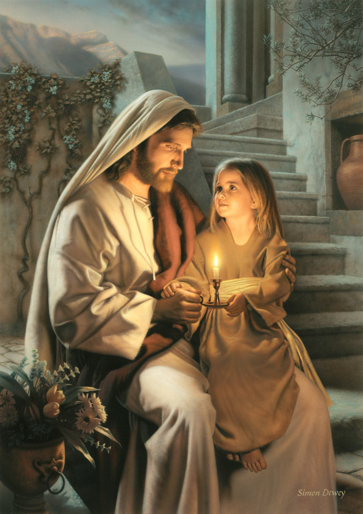 Jesus holding a girl and sharing a candle that is lighting their faces.