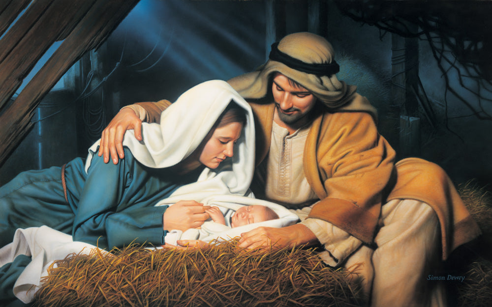 Joseph and Mary look at baby Jesus as he sleeps in the manger.