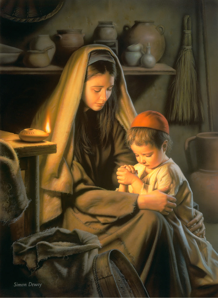 The boy Jesus kneels beside his mother Mary as they pray together.