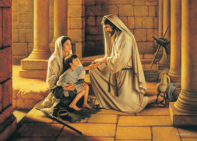 Jesus heals a young boy who is sitting on his mother's lap.
