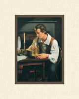 Joseph Smith is seated at a table examining the gold plates. Art 5